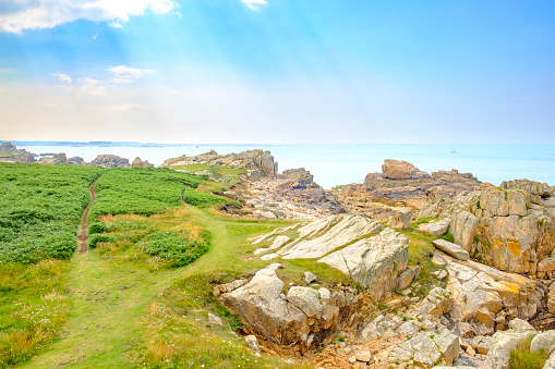 Ile de Bréhat at the Côtes d'Armor in Bretagne France during a beautiful summer day. Ile de Brehat is a popluair tourist destination and a place to spend a vacation in one of the idyllic cottages.