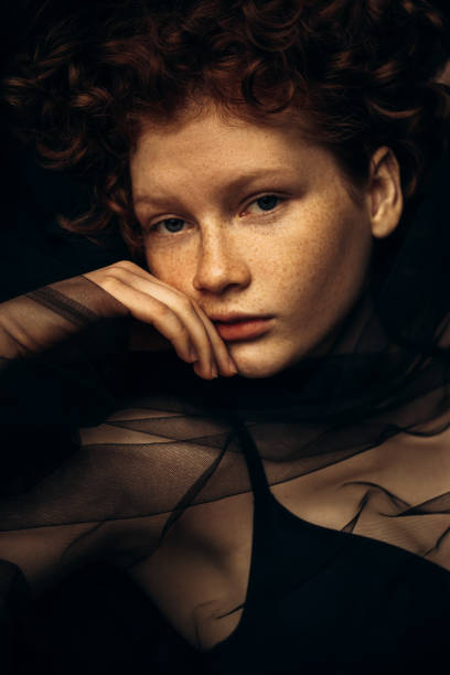 istock beautiful woman with freckles 1407080892