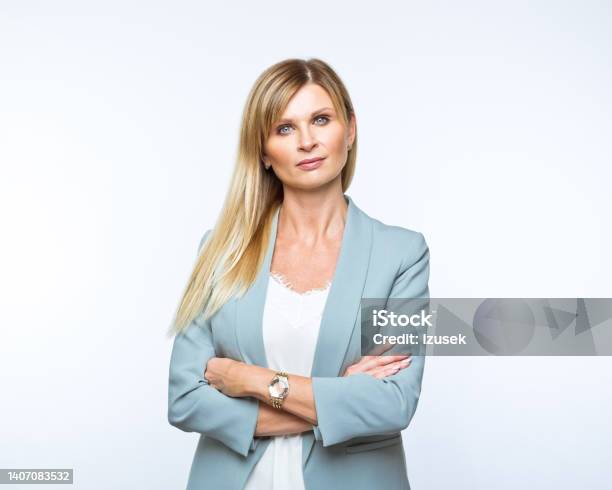Portrait Of Confident Businesswoman Stock Photo - Download Image Now - Women, One Woman Only, Blond Hair