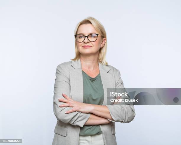 Portrait Of Confident Mature Women Stock Photo - Download Image Now - Looking Away, Businesswoman, Cut Out