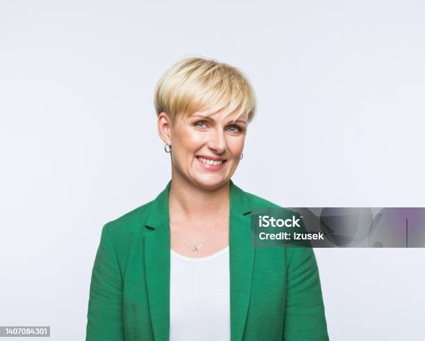 Portrait Of Happy Businesswoman Stock Photo - Download Image Now - Blond Hair, Businesswoman, Confidence