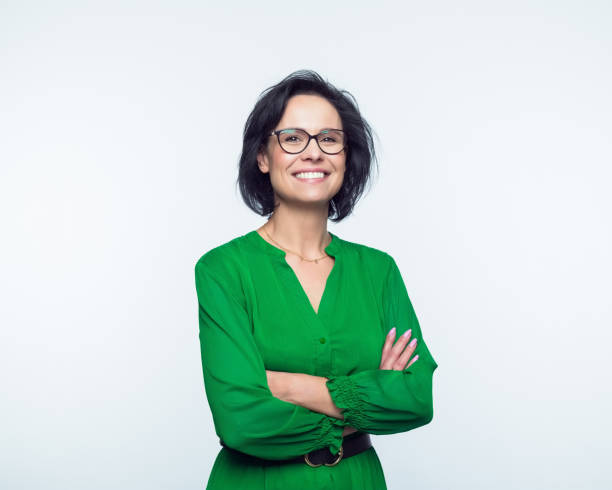 portrait of happy mature women - braços cruzados imagens e fotografias de stock