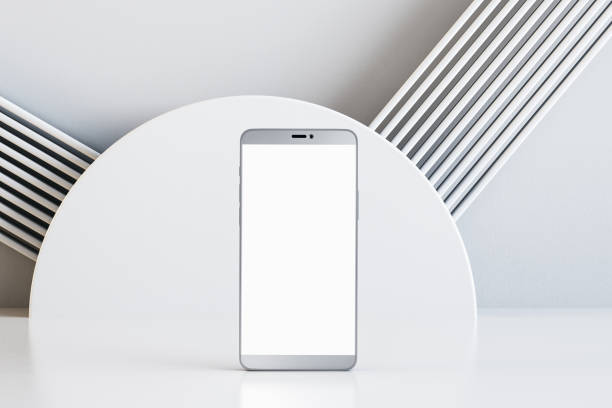 istock Close up of empty mobile phone with white screen on light background. Presentation and mock up place concept. 3D Rendering. 1407084543