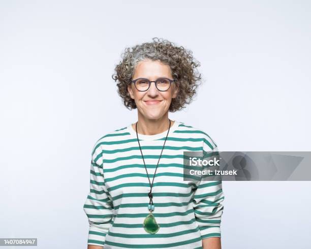 Portrait Of Smiling Mature Women Stock Photo - Download Image Now - Women, 50-59 Years, One Woman Only
