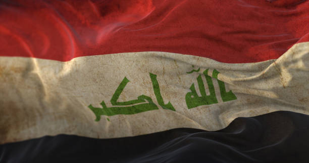 Old Irak Flag waving at wind Old Irak Flag waving at wind iraqi flag stock pictures, royalty-free photos & images