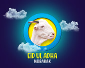 Eid Al Adha festival. Greeting card with sacrificial Goat and crescent on cloudy night background. Eid Mubarak theme