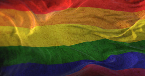 istock Old rainbow flag, LGBT pride Flag waving at wind 1407090811