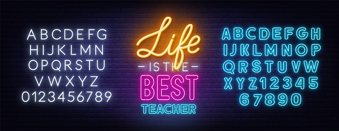 Life is the best teacher neon quote on a brick wall. Inspirational glowing lettering. White and blue neon alphabets.