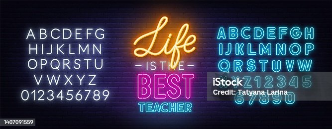 istock Life is the best teacher neon quote on a brick wall. 1407091559