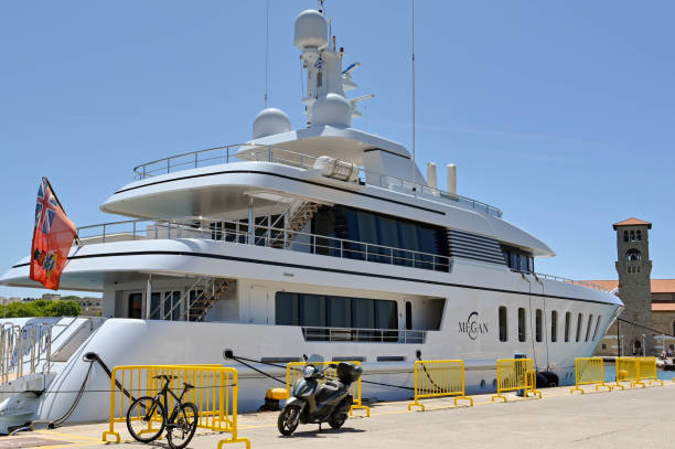 Rhodes, Greece - May 2022: Luxury motor yacht Megan. It is owned by Israeli businesswoman Shari Arison and named after her daughter