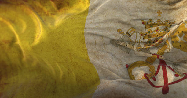 istock Old Vatican City Flag waving at wind 1407093551