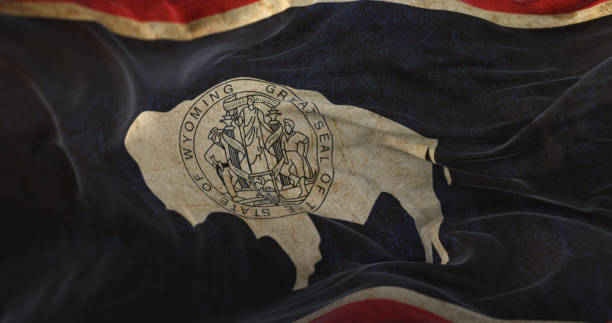 Old Wyoming State Flag waving at wind