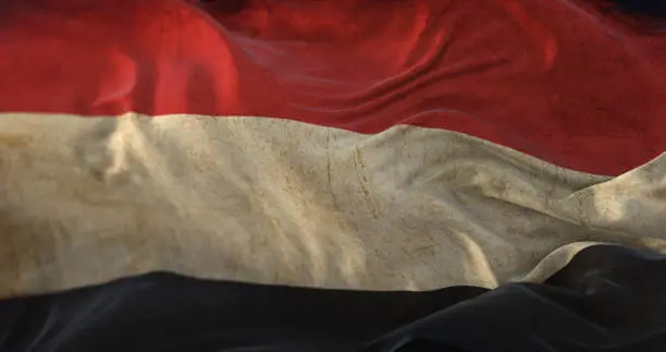 Photo of Old Yemen Flag waving at wind