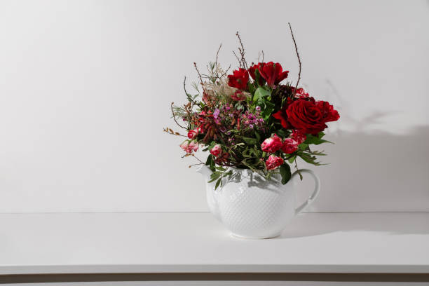 istock Flower bouquet in a teapot 1407096428