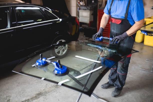istock Replacement of car glass in a car service. 1407096772