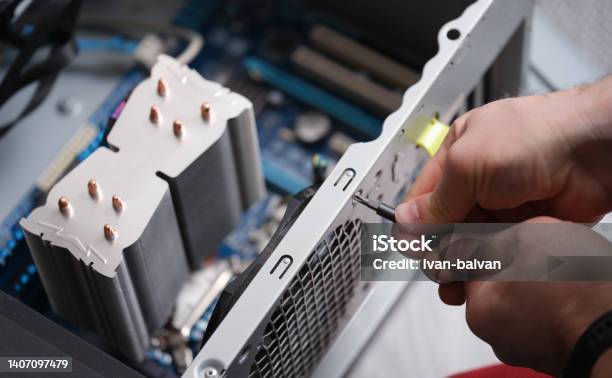 Technician Repairing Computer Power Supply Closeup Computer Disassembly Stock Photo - Download Image Now