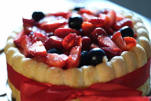 Delicious sweet fresh pie with fruits and berries. Strawberry cake concept
