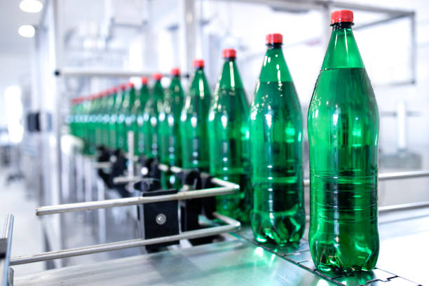 istock Bottled drinking water being produced in water factory. 1407099446