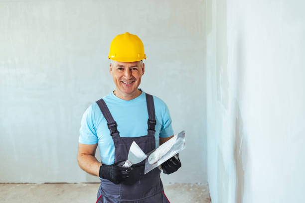istock Portrait of Plasterer working indoors 1407100015