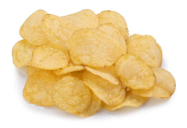 istock Isolated chips of potato on white background. 1407102600