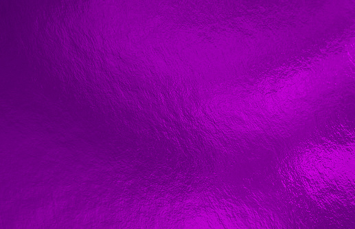 Purple foil background with uneven texture