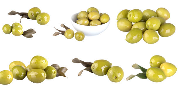 istock Large green olives isolated on a white background 1407107728