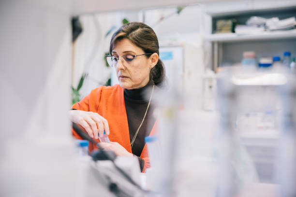 istock Female scientist working at laboratory 1407108353
