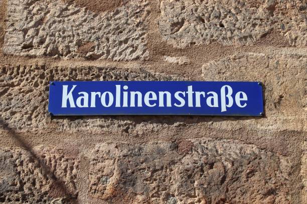 Karolinenstrasse in Nuremberg, Germany Nuremberg city, Germany. Sign with street name - Karolinenstrasse. karolinenstrasse stock pictures, royalty-free photos & images