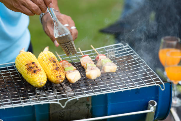 istock Chef cooking by grilling to wait for camping activity 1407110166