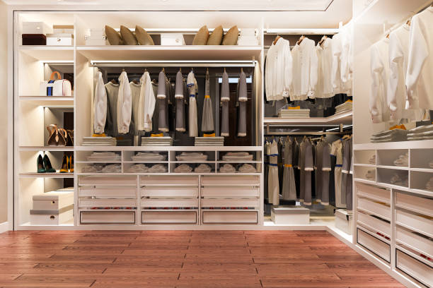istock 3d rendering luxury scandinavian wood walk in closet with wardrobe and make up table 1407112040