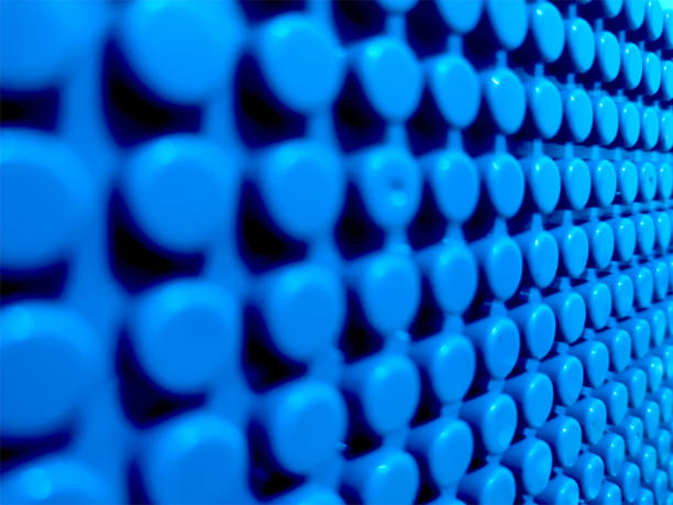 Close-up photo of blue block toy board forming a bulge pattern
