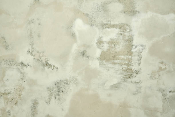 istock Concrete wall texture, leveled with plaster, prepared for finishing work 1407121186