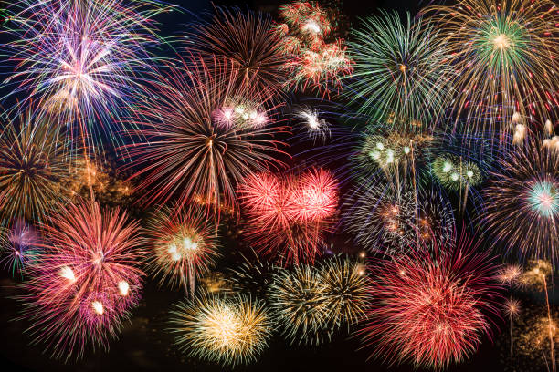 istock colorful fireworks fully shining on black background 1407124556