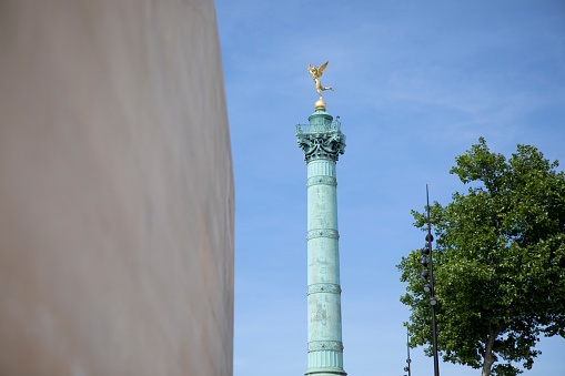 The Colonne de Juillet stands in the center of the Place de la Bastille and commemorates the French Revolution. Viewed here from the south side of the square