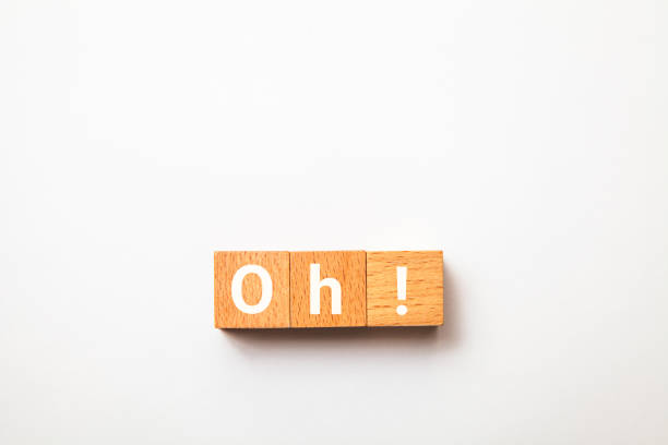 istock Oh character. surprise. Written on three wooden blocks. White letters. 1407126417