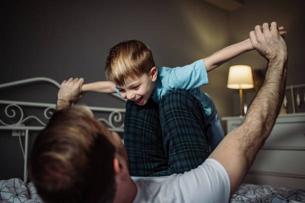 istock Father and son playing in the morning 1407128232