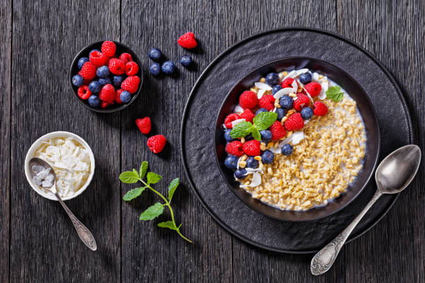 istock hulled whole grain oat porridge with berries 1407128298