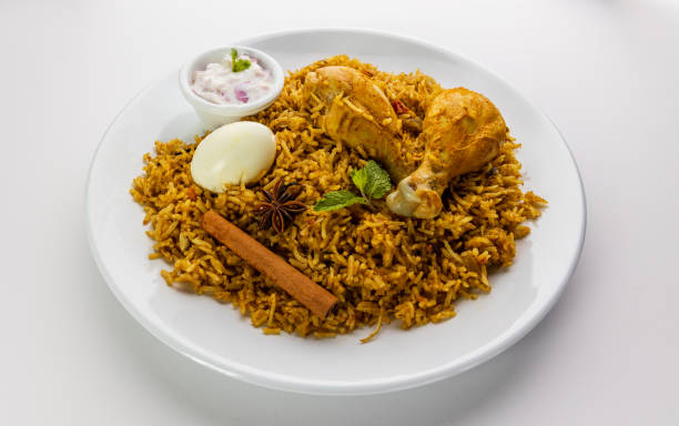 istock Chicken biryani Spicy Indian Malabar biryani Hyderabadi biryani pulao with egg. Beautiful shot of Kerala India Sri Lanka style biriyani made of basmati rice 1407129037