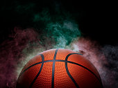 istock basketball on the color smoke background 1407129650