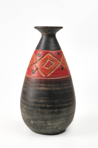 istock Antique black and red vintage pottery, vase on white background 1407132159