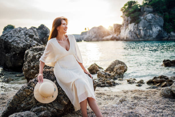 istock Woman by the sea 1407132168