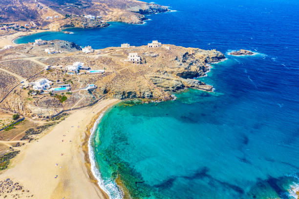 Aerial drone view of Fokos beach on Mykonos island, Greece Aerial drone view of Fokos beach on Mykonos island, Greece. cyclades islands stock pictures, royalty-free photos & images