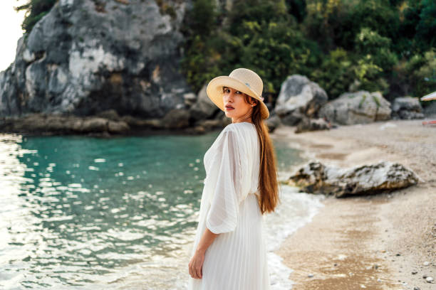istock Woman by the sea 1407133686
