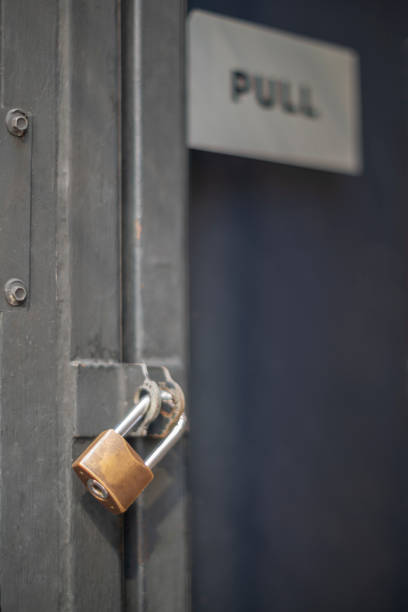 istock Close up old lock on the door 1407135053