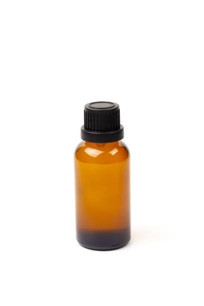 istock Essential oil in amber bottle. 1407135549