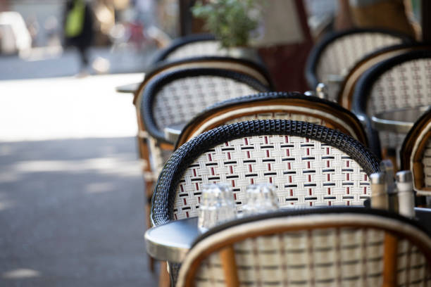 istock Chairs on the pavement in Paris 1407136881