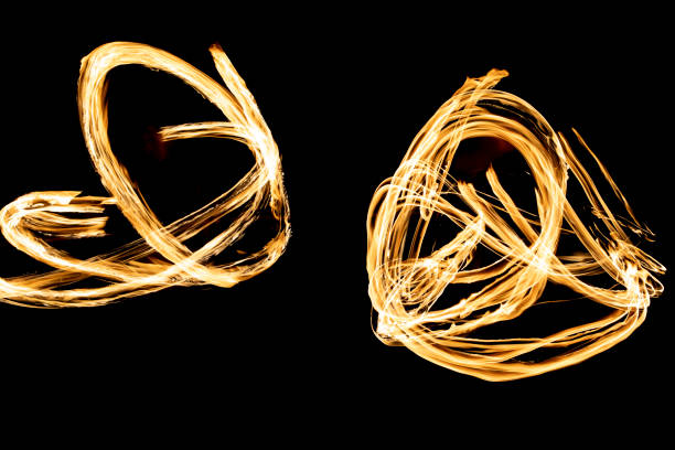 istock Flames in dark. Fire on black background. 1407138689