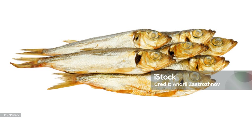 Smoked herring fish cut out on a white background. Grilled Stock Photo