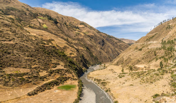 istock river near yellow mountains 1407143085