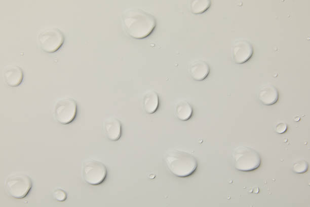 istock Abstract water drops on grey background, macro, Bubbles close up 1407147517